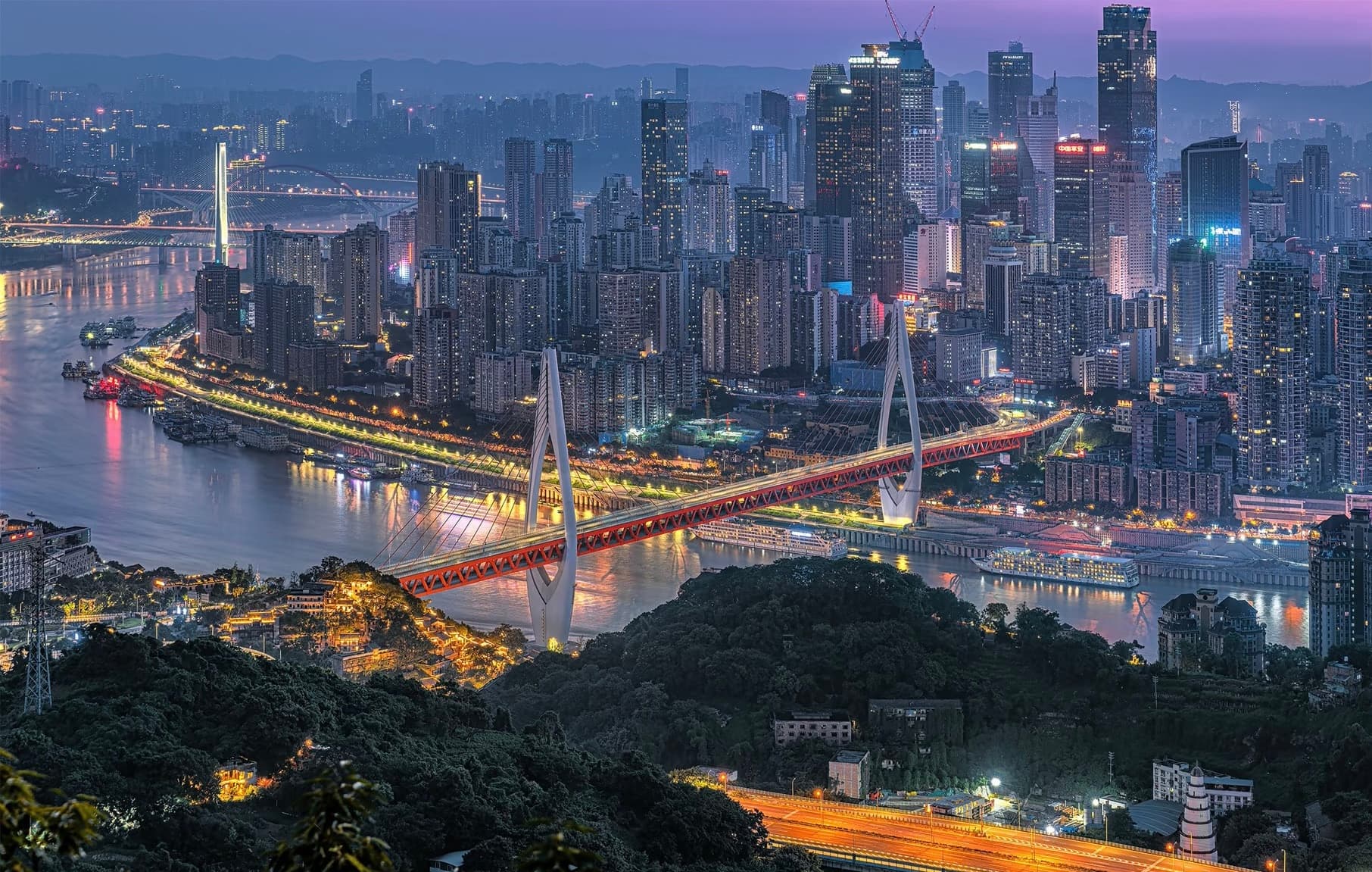 Chongqing skyline and river bridges at night